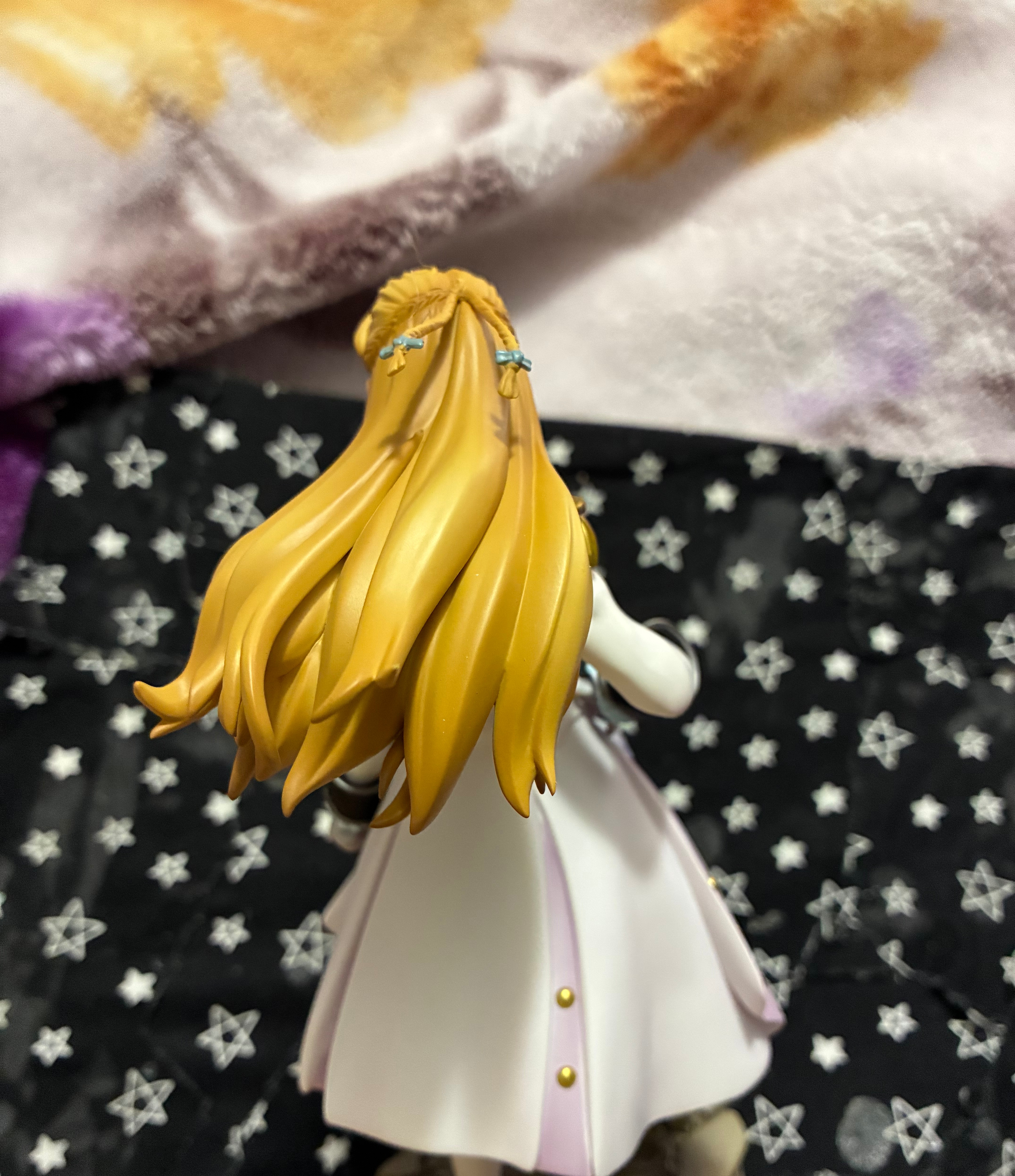 Back of Gundam wing Relena figure in her Sanc outfit standing on rubble showing her braids